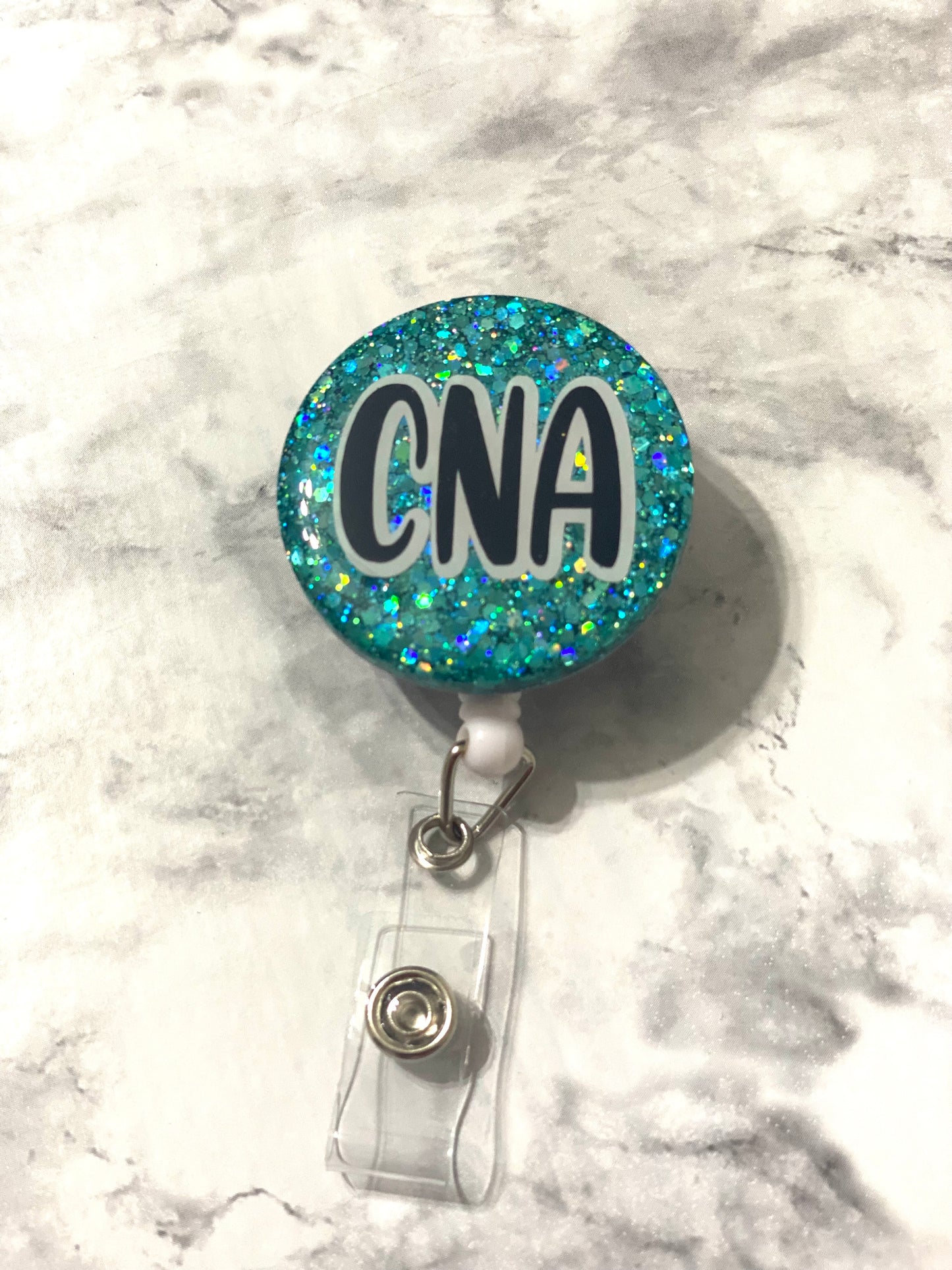 RTS- Teal Holographic CNA Badge Reel
