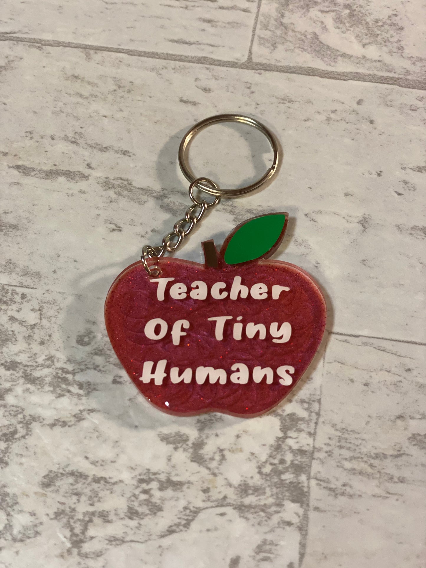 Teacher of Tiny Human Keychains