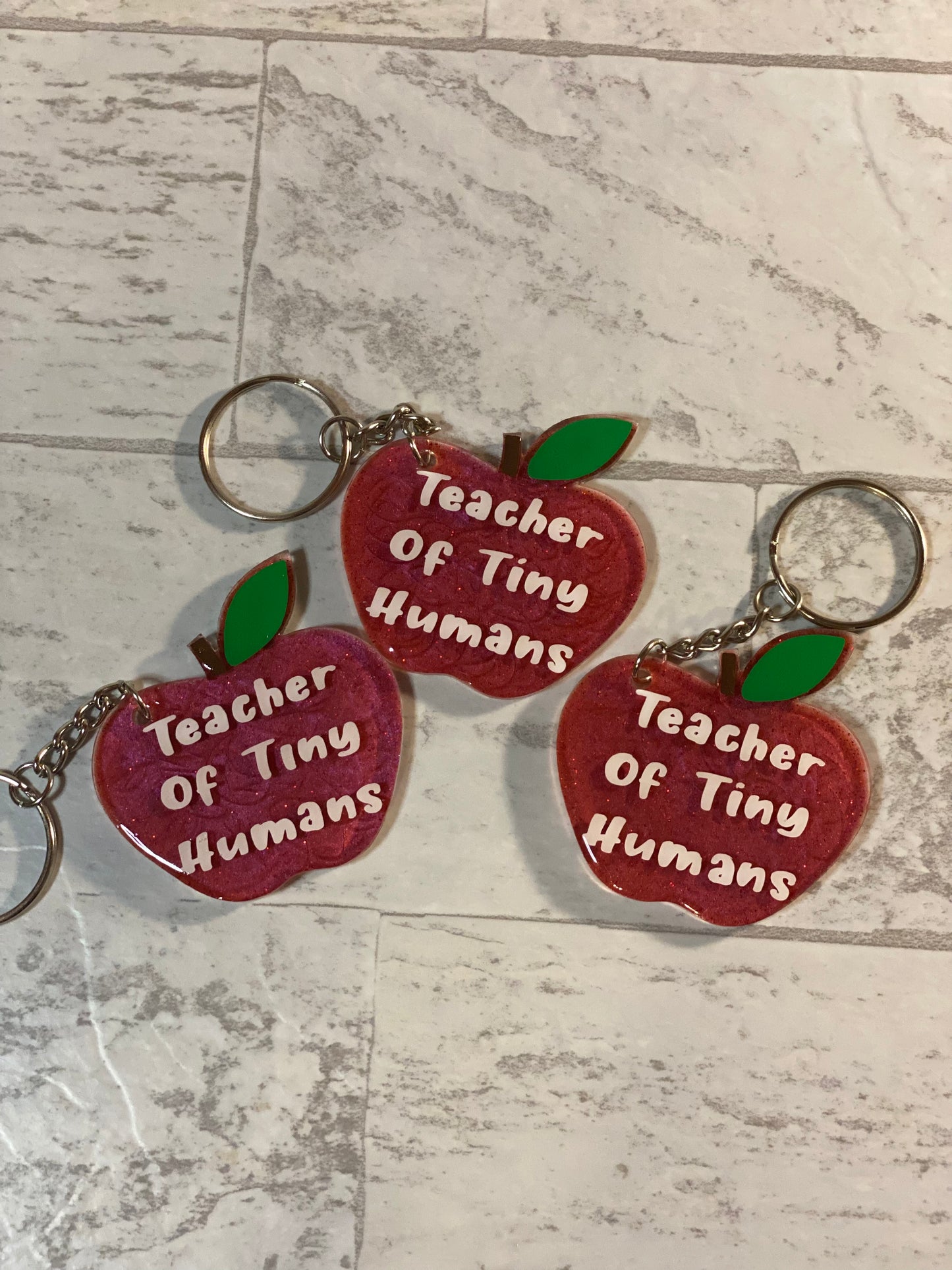 Teacher of Tiny Human Keychains