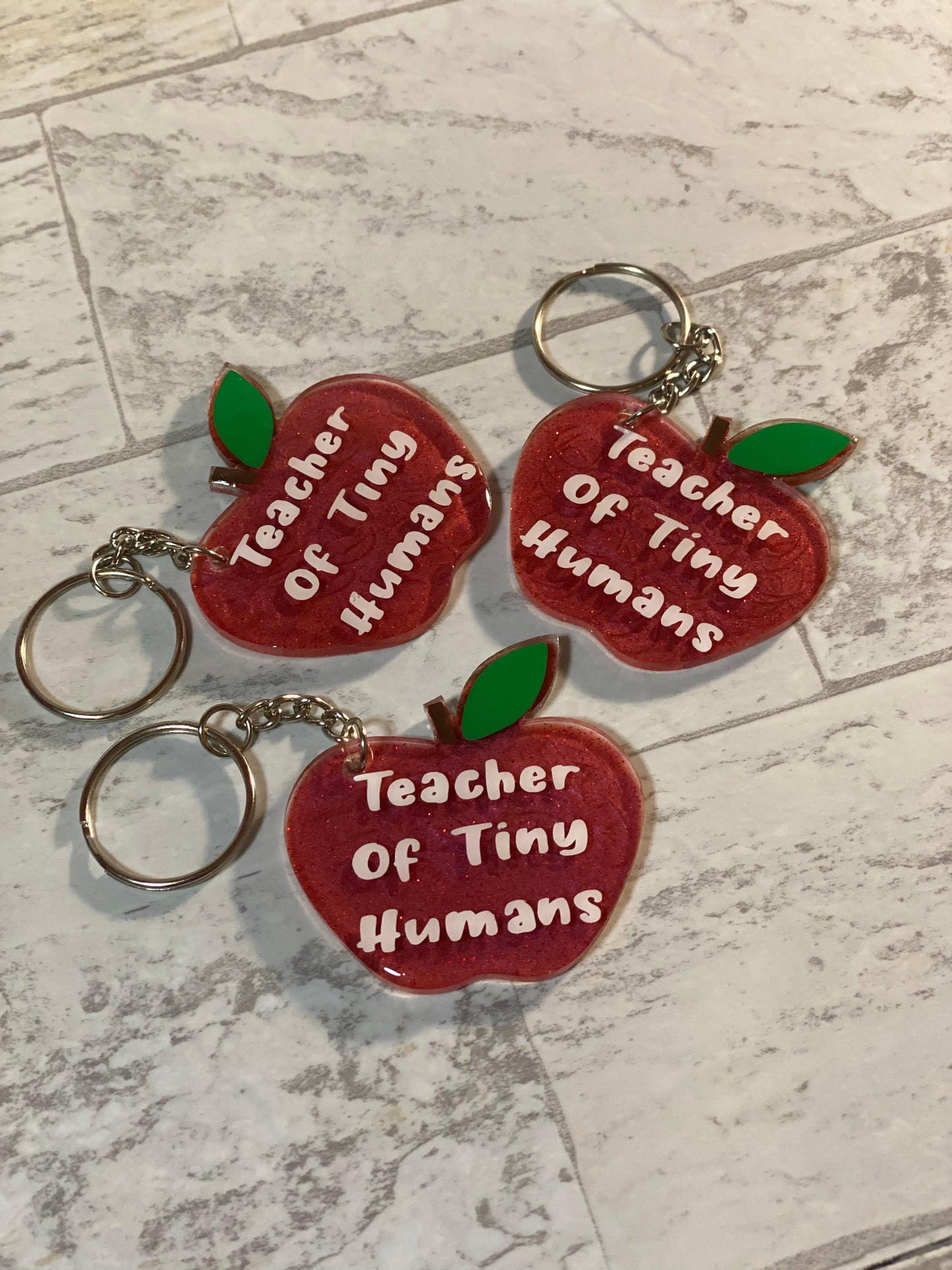 Teacher of Tiny Human Keychains