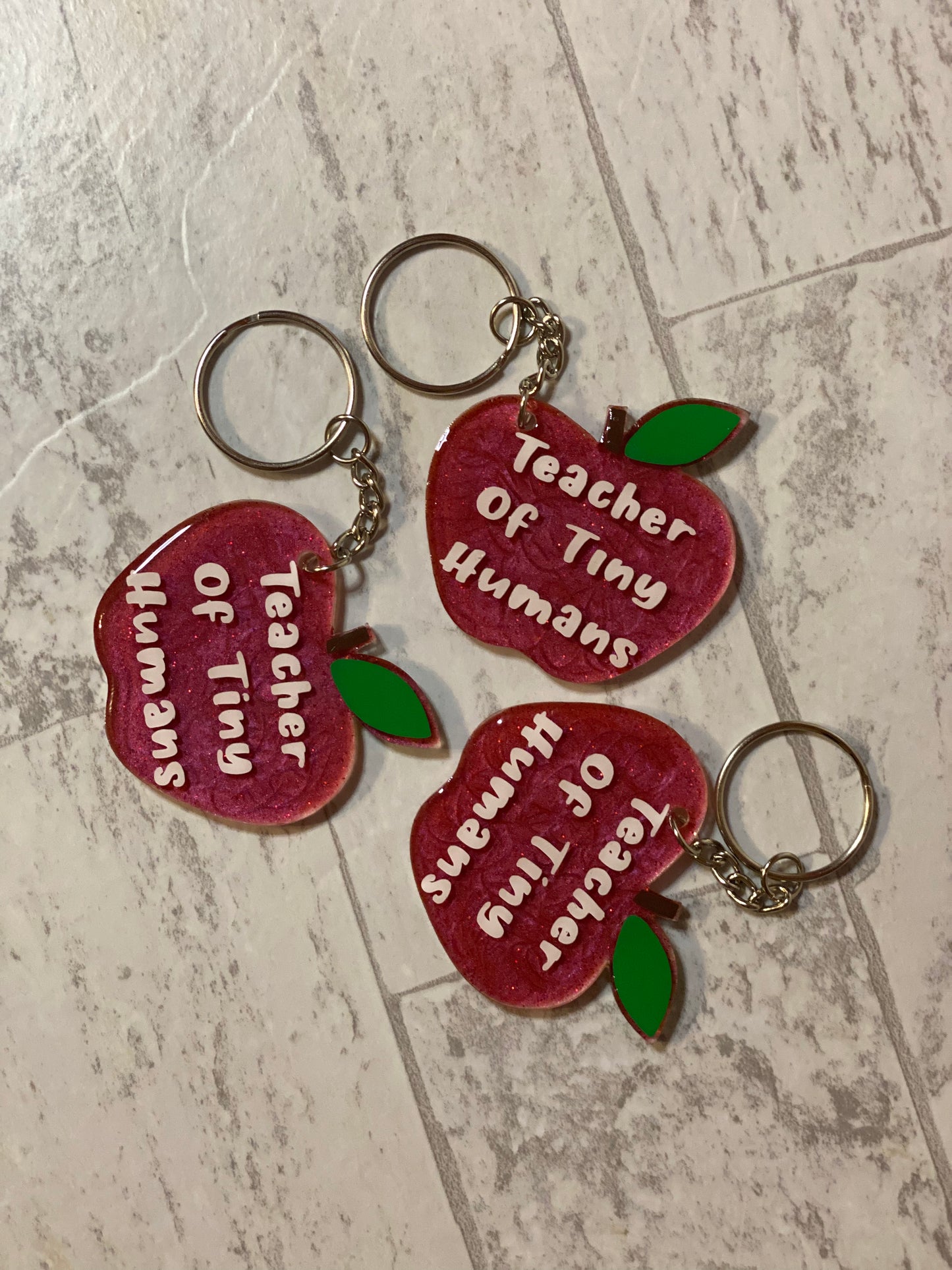 Teacher of Tiny Human Keychains