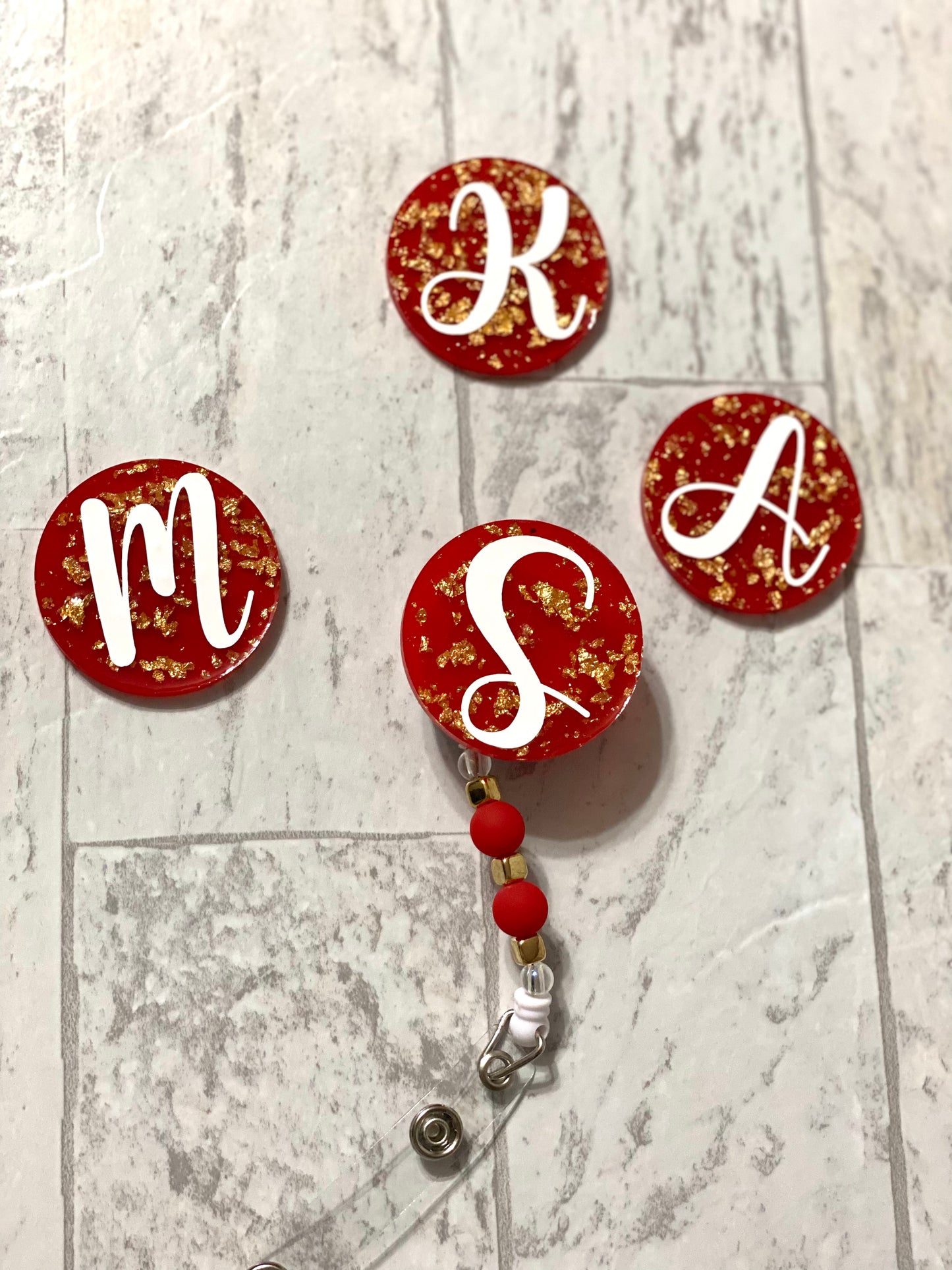Red and Gold Badge Reel