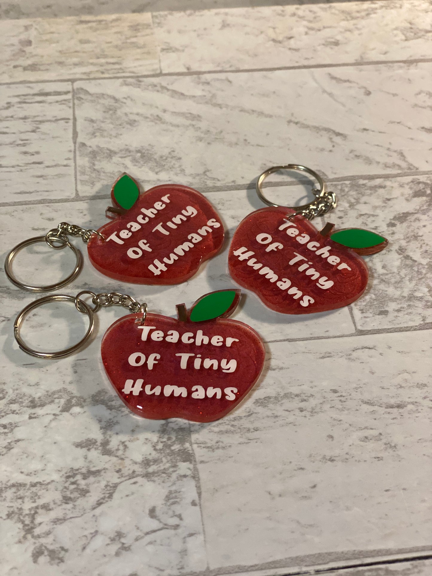 Teacher of Tiny Human Keychains