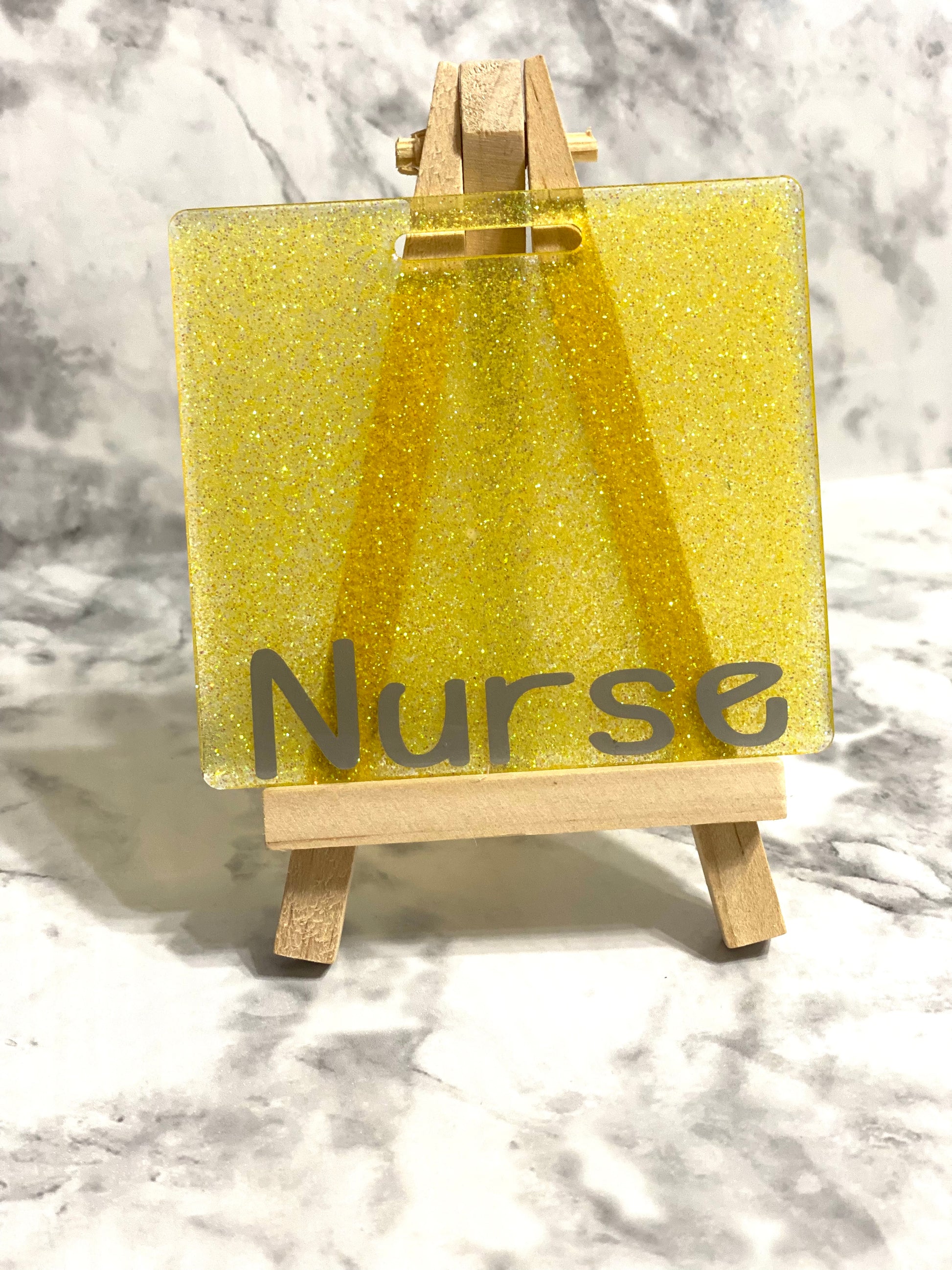 This is Yellow fine Glitter With Silver vinyl in Lemonade Font